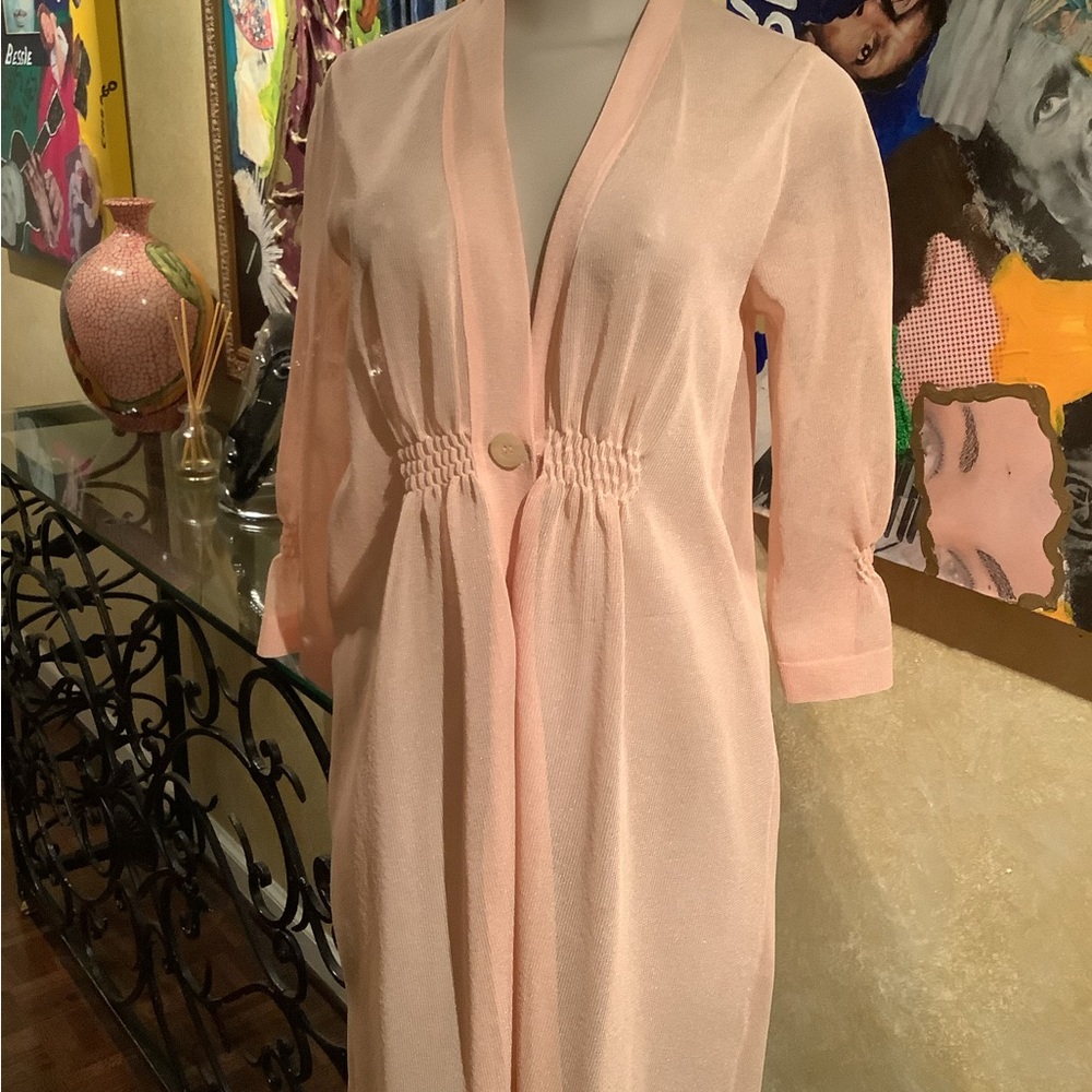 Sheer duster with long sleeves.